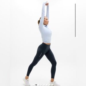 Athleta women’s Rainier High Rise Legging in black with pockets size medium